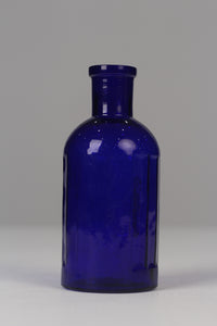 Set of 4 Blue glass bottles / flower vase 07" - GS Productions