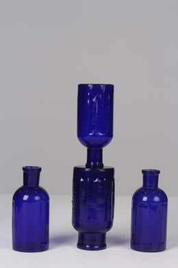 Set of 4 Blue glass bottles / flower vase 07