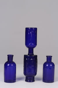 Set of 4 Blue glass bottles / flower vase 07" - GS Productions