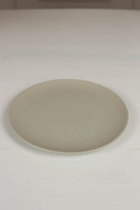 beige ceramic plate. - GS Productions