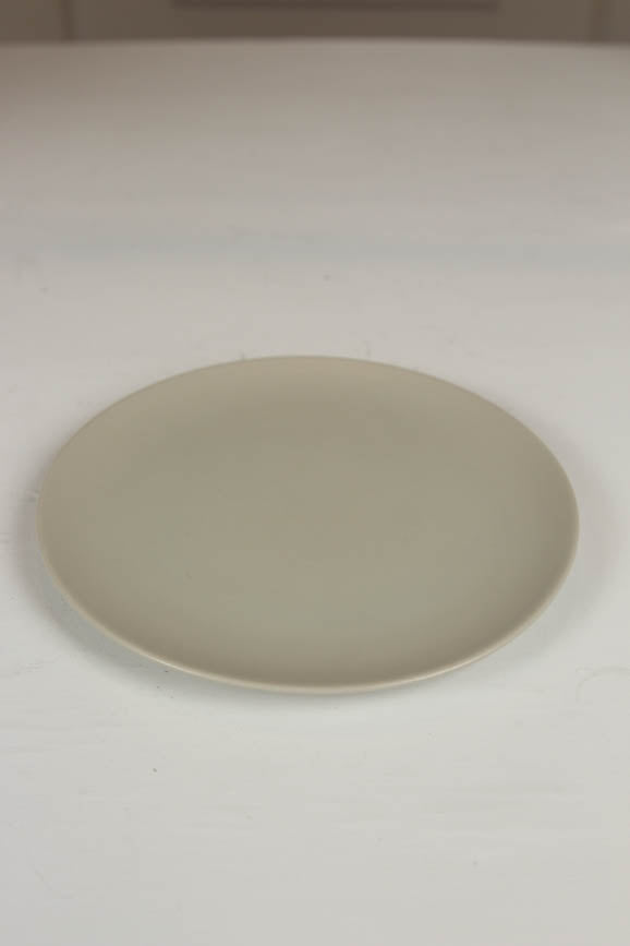beige ceramic plate. - GS Productions