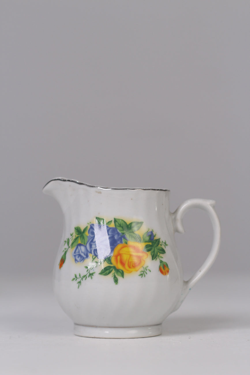 White, Yellow, green & blue milk pot 04