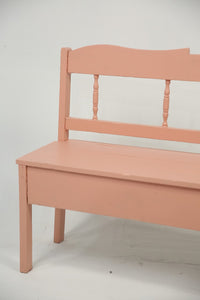 Peach coloured wooden bench. - GS Productions