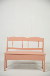Peach coloured wooden bench. - GS Productions