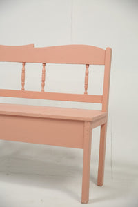 Peach coloured wooden bench. - GS Productions
