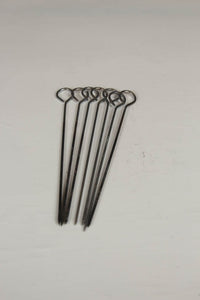 set of 7 silver burger skewers. - GS Productions